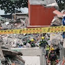 Caution tape cordons off a building collapsed by the earthquake in Cali, Colombia, Sunday, Aug. 16, 2026. (AP Photo/Santiago Saldarriaga)