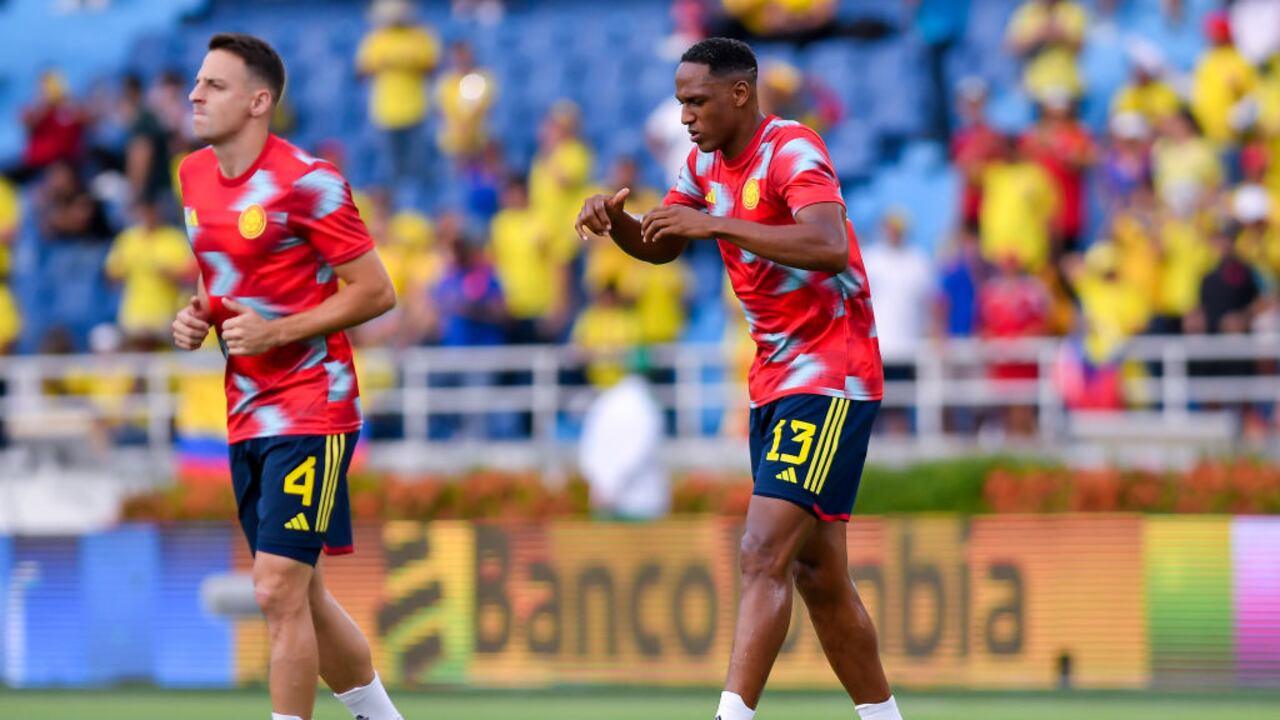 BARRANQUILLA, COLOMBIA - SEPTEMBER 07: Santiago Arias and Yerry Mina of Colombia warm up prior a FIFA World Cup 2026 Qualifier match between Colombia and Venezuela at Metropolitano Stadium on September 07, 2023 in Barranquilla, Colombia. (Photo by Gabriel Aponte/Getty Images)
