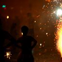 Mpd 5159: A young boy watching the fire crackers bursting in marine drive in south Bombay now Mumbai, Maharashtra, India.