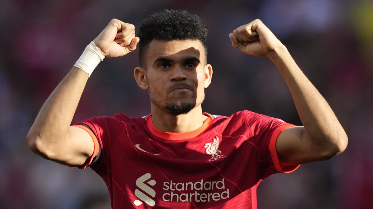 Liverpool's Luis Diaz applauds fans at the end of the English FA Cup semifinal soccer match between Manchester City and Liverpool at Wembley stadium in London, Saturday, April 16, 2022. (AP/Frank Augstein)