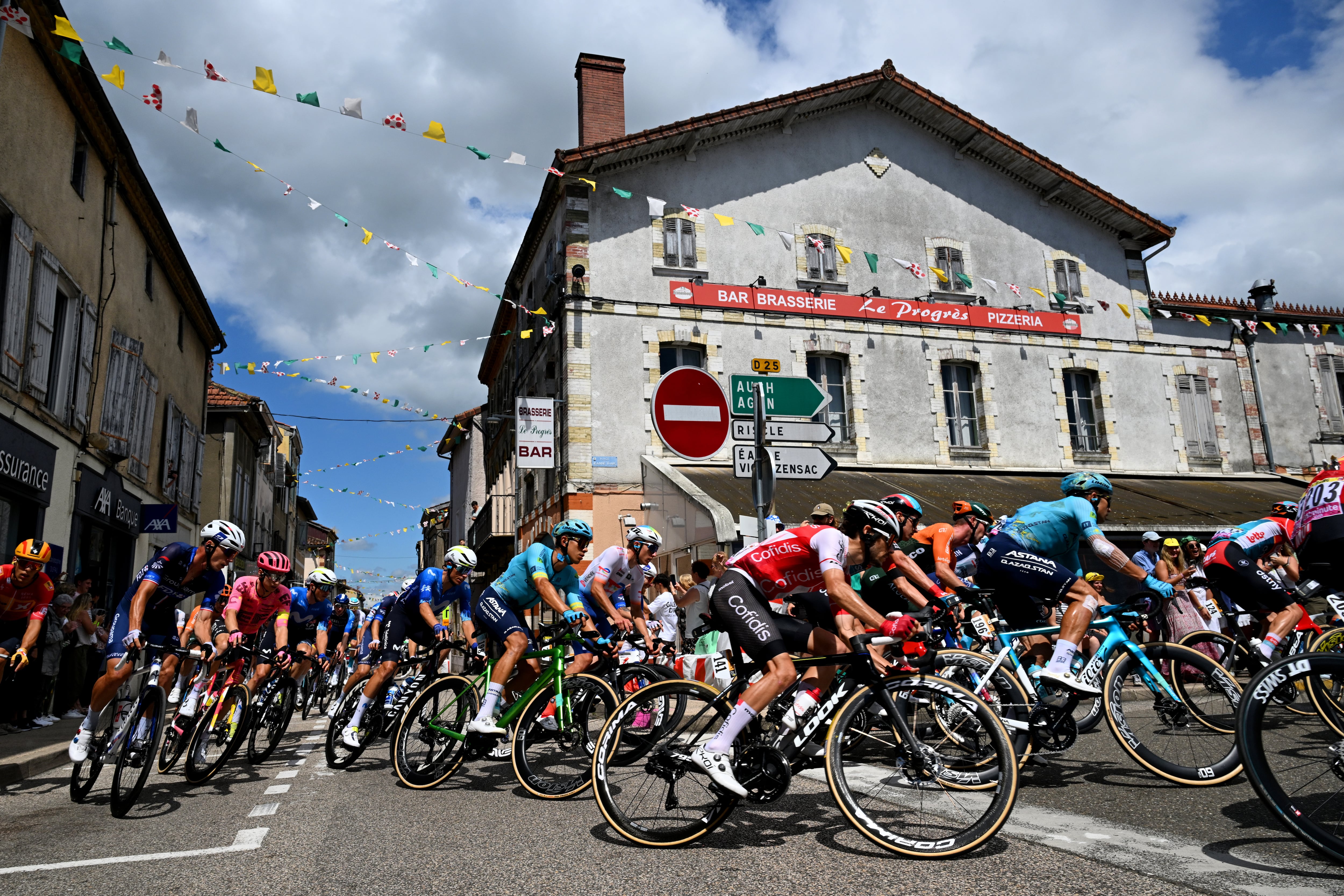PAU, FRANCE - JULY 12: (L-R) Enric Mas of Spain and Movistar Team, Harold Tejada of Colombia and Astana Qazaqstan Team, Guillaume Martin of France and Team Cofidis and a general view of the peloton competing at Nogaro village during the 111th Tour de France 2024, Stage 13 a 165.3km stage from Agen to Pau / #UCIWT / on July 12, 2024 in Pau, France. (Photo by Tim de Waele/Getty Images)