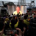 Supporters of Colombian presidential candidate for the 'Anti-corruption Leaders league' Rodolfo Hernandez celebrate in Bucaramanga, Colombia, on May 29, 2022, after the results of the presidential elections. - Colombian voters gave a leftist ex-guerrilla a historic lead Sunday in the country's first round of presidential elections that will culminate in a runoff in June. With more than 97 percent of votes counted, preliminary results showed 62-year-old Gustavo Petro, a former Bogota mayor, leading with 40.3 percent to 28 percent for Rodolfo Hernandez, a 77-year-old populist outsider in surprise second place. (Photo by Schneyder MENDOZA / AFP)