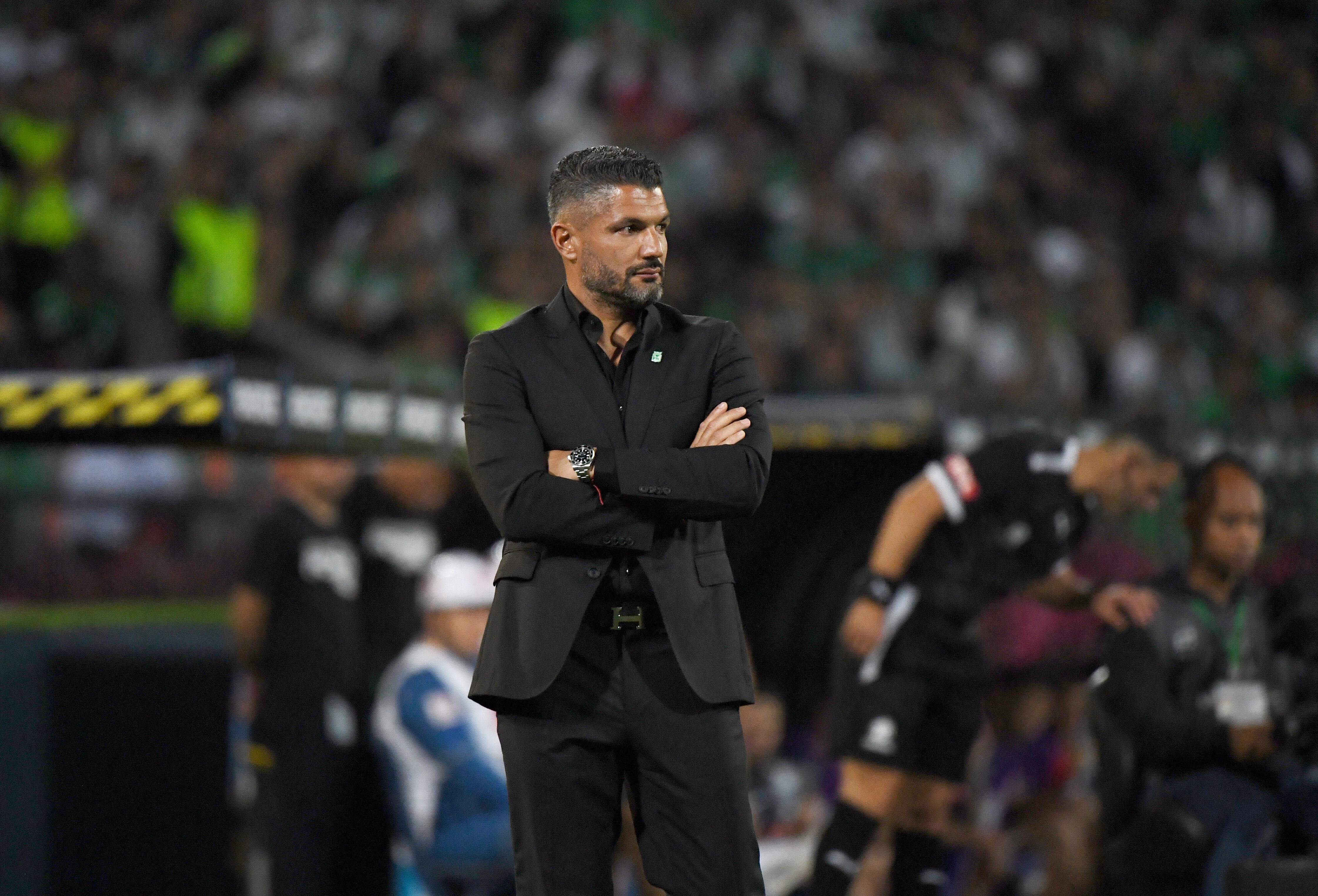 Atletico Nacional's Argentine head coach Javier Gandolfi gestures before the Copa Libertadores group stage first round football match between Colombia's Atletico Nacional and Uruguay's Nacional at the Atanasio Girardot stadium in Medellin, Antioquia department, Colombia, on April 2, 2025. (Photo by Jaime SALDARRIAGA / AFP)