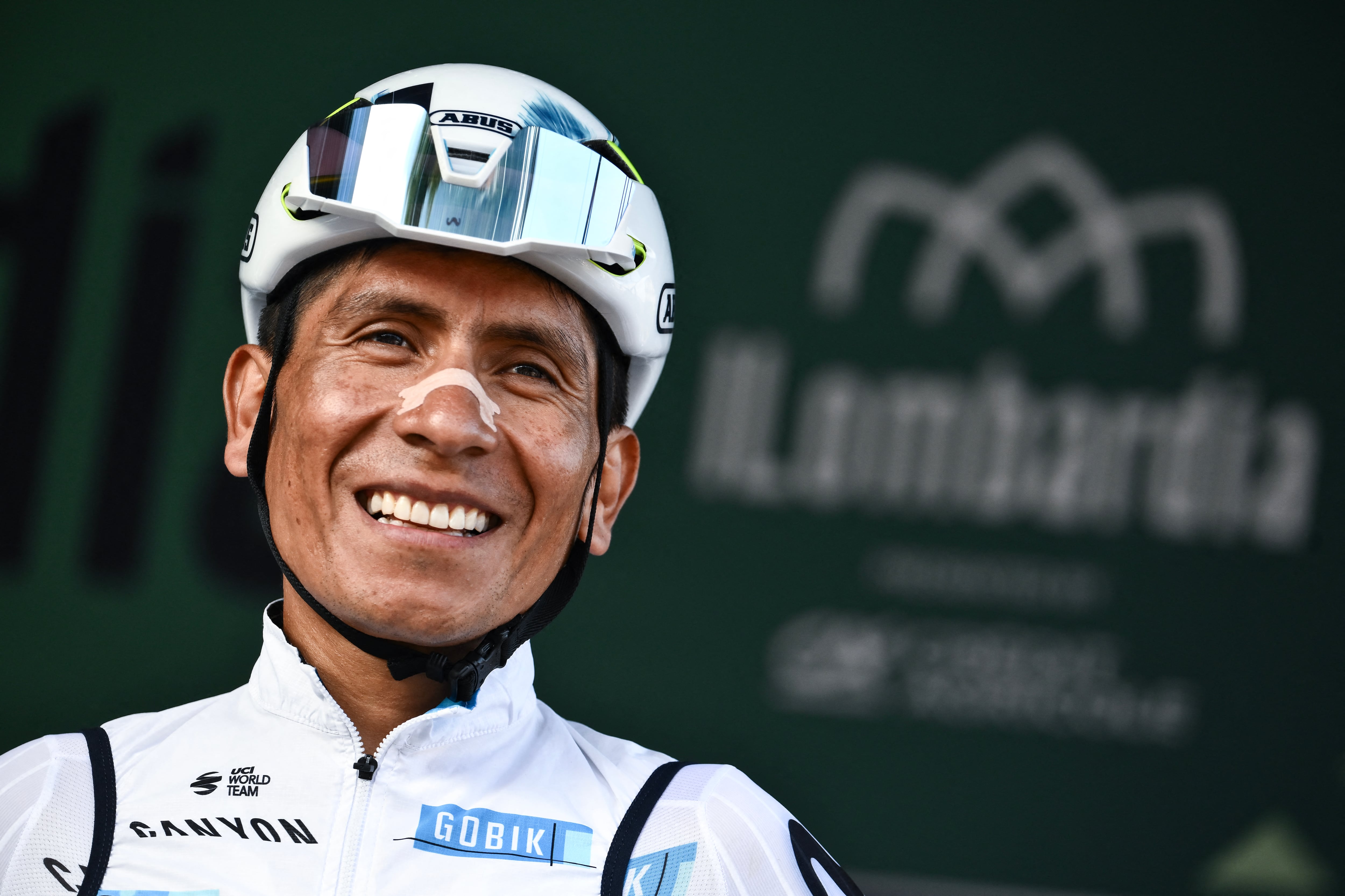 Movistar Team�s Colombian rider Nairo Quintana looks on from the sign-in podium ahead of the 119th edition of the Giro di Lombardia (Tour of Lombardy), a 238km cycling race from Como to Bergamo on October 11, 2025. (Photo by Marco BERTORELLO / AFP)