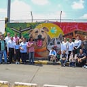 El Terminal de transporte de Cali pintó un mural con las caras de un perro y un gato como parte del compromiso.