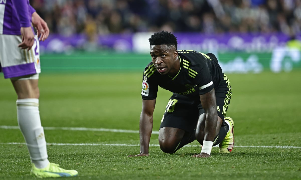 Real Madrid's Vinicius Junior gets up from the ground during a Spanish La Liga soccer match between Valladolid and Real Madrid at the Jose Zorrilla stadium in Valladolid, Spain, Friday, Dec. 30, 2022. (AP Photo/Pablo Garcia)