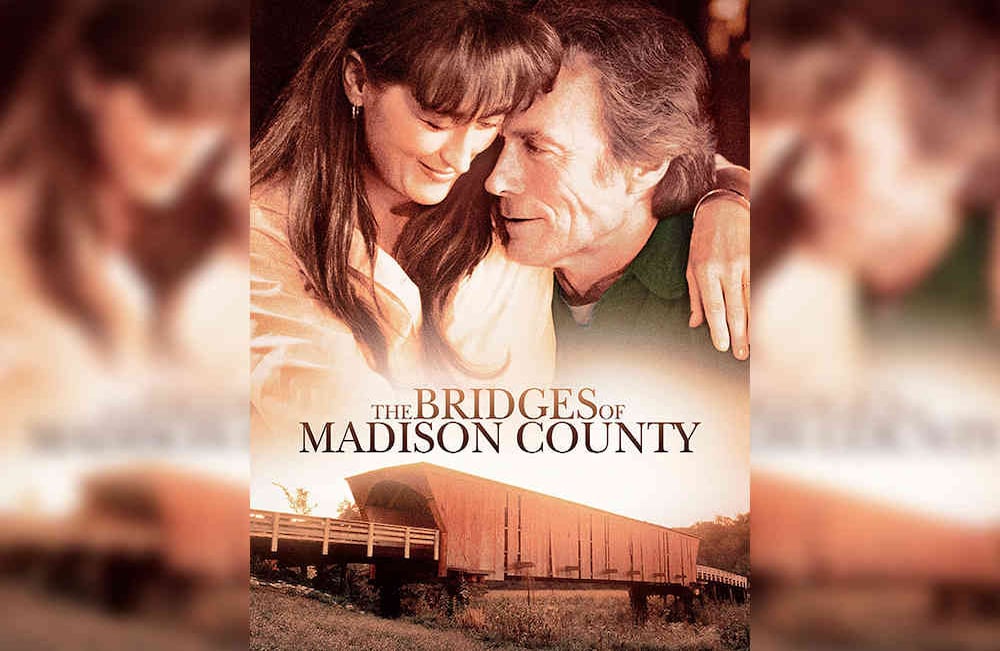 Los puentes de Madison 1995:  Francesca Johnson (Meryl Streep) es una solitaria ama de casa del Medio Oeste a quien le cambian sus días tras la llegada de Robert Kincaid (Clint Eastwood), un fotógrafo de la revista National Geographic. Juntos se enamoran y eso supone un giro fundamental en sus vidas. Sobre todo para Francesca quien ya tiene un hogar. 