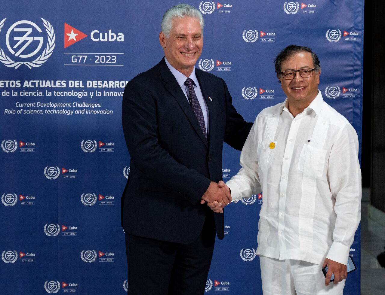 Colombia's President Gustavo Petro (R) is received by Cuba's President Miguel Diaz Canel upon arrival at the Convention Center in Havana on September 15, 2023. The G77+China, a group of developing and emerging countries representing 80 percent of the global population, gathers Friday in Cuba seeking to promote a "new economic world order" amid warnings of growing polarization. (Photo by Yamil LAGE / POOL / AFP)