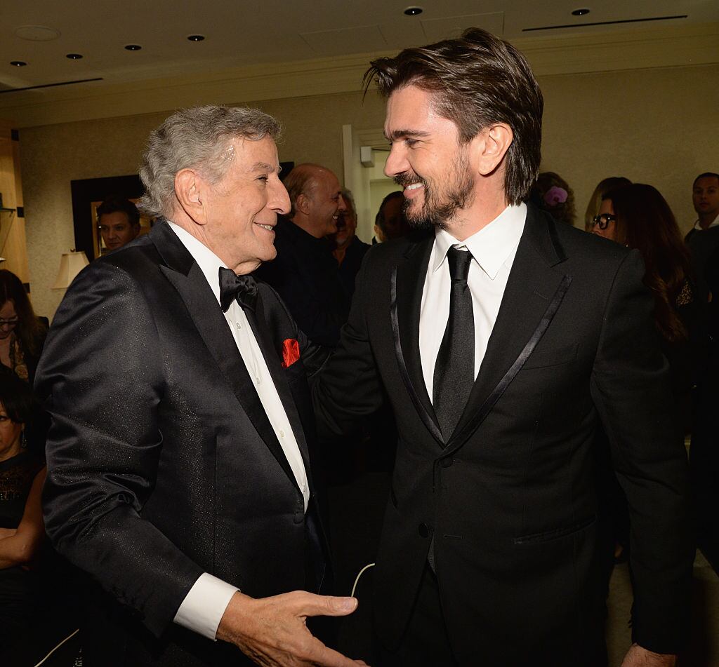 Singer Tony Bennett (L) and recording artist Juanes pose backstage during "Sinatra 100: An All-Star GRAMMY Concert" celebrating the late Frank Sinatra's 100th birthday at the Encore Theater at Wynn Las Vegas on December 2, 2015 in Las Vegas, Nevada. The show will air on CBS on December 6.  (Photo by Kevin Mazur/WireImage)