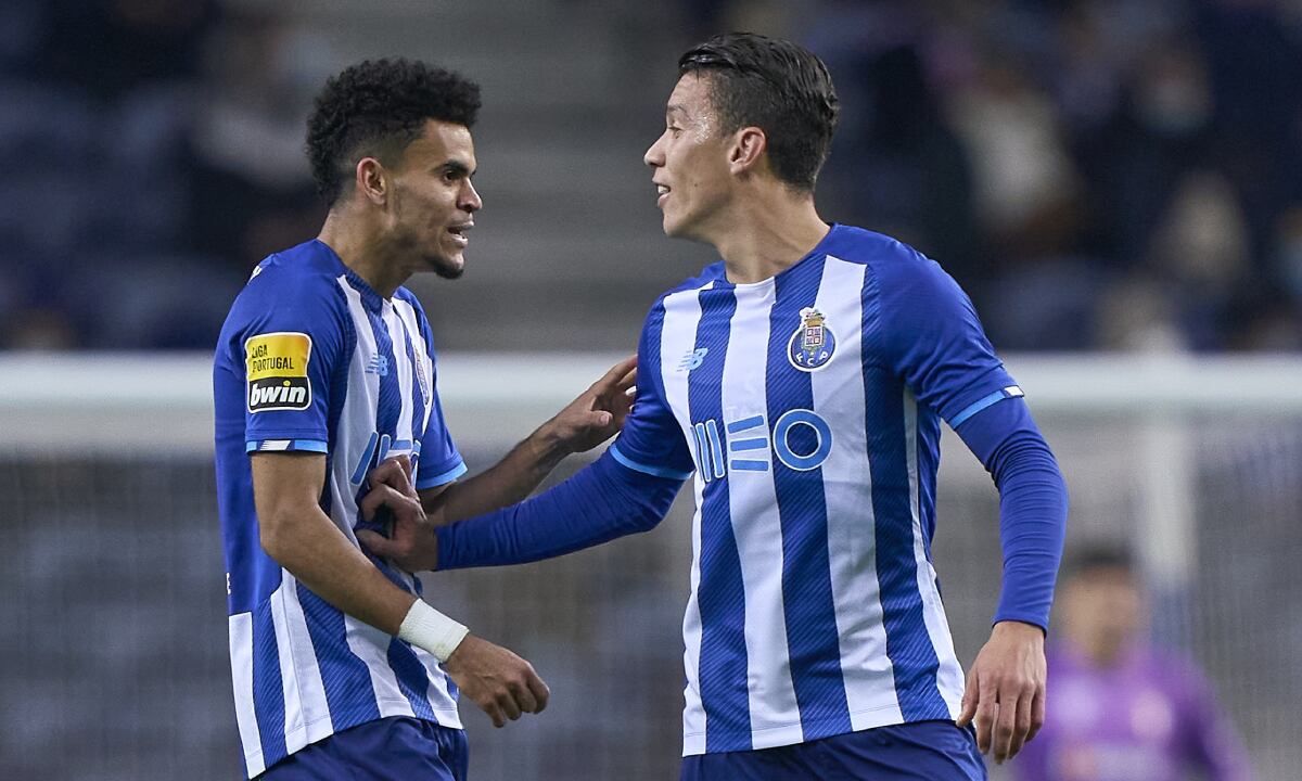 PORTO, PORTUGAL - DECEMBER 12: Luis Diaz of FC Porto celebrates with Mateus Uribe of FC Porto after scoring their side's first goal during the Liga Portugal Bwin match between FC Porto and SC Braga at Estadio do Dragao on December 12, 2021 in Porto, Portugal. (Photo by Getty Images/Jose Manuel Alvarez/Quality Sport Images)