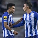 PORTO, PORTUGAL - DECEMBER 12: Luis Diaz of FC Porto celebrates with Mateus Uribe of FC Porto after scoring their side's first goal during the Liga Portugal Bwin match between FC Porto and SC Braga at Estadio do Dragao on December 12, 2021 in Porto, Portugal. (Photo by Jose Manuel Alvarez/Quality Sport Images/Getty Images)