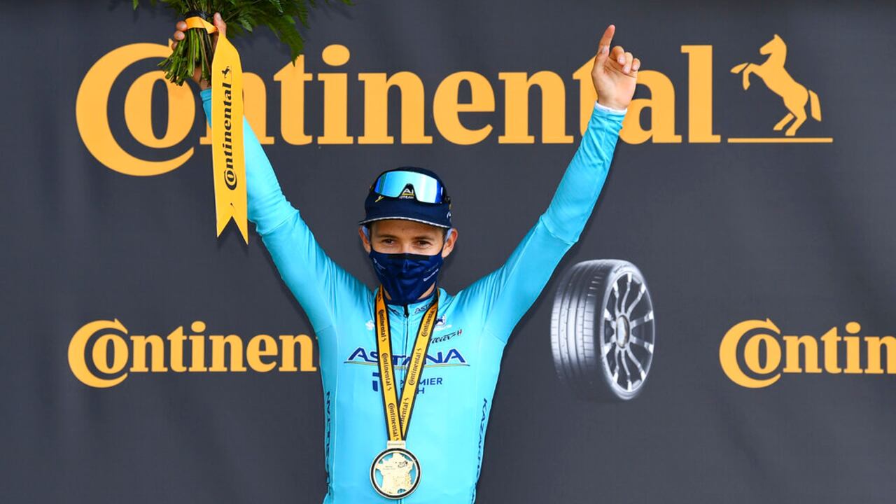 Stage winner Colombia's Miguel Angel Lopez celebrates on the podium after stage 17 of the Tour de France cycling race over 107 kilometers (105.6 miles) from Grenoble to Meribel Col de la Loze, France, Wednesday, Sept. 16, 2020.