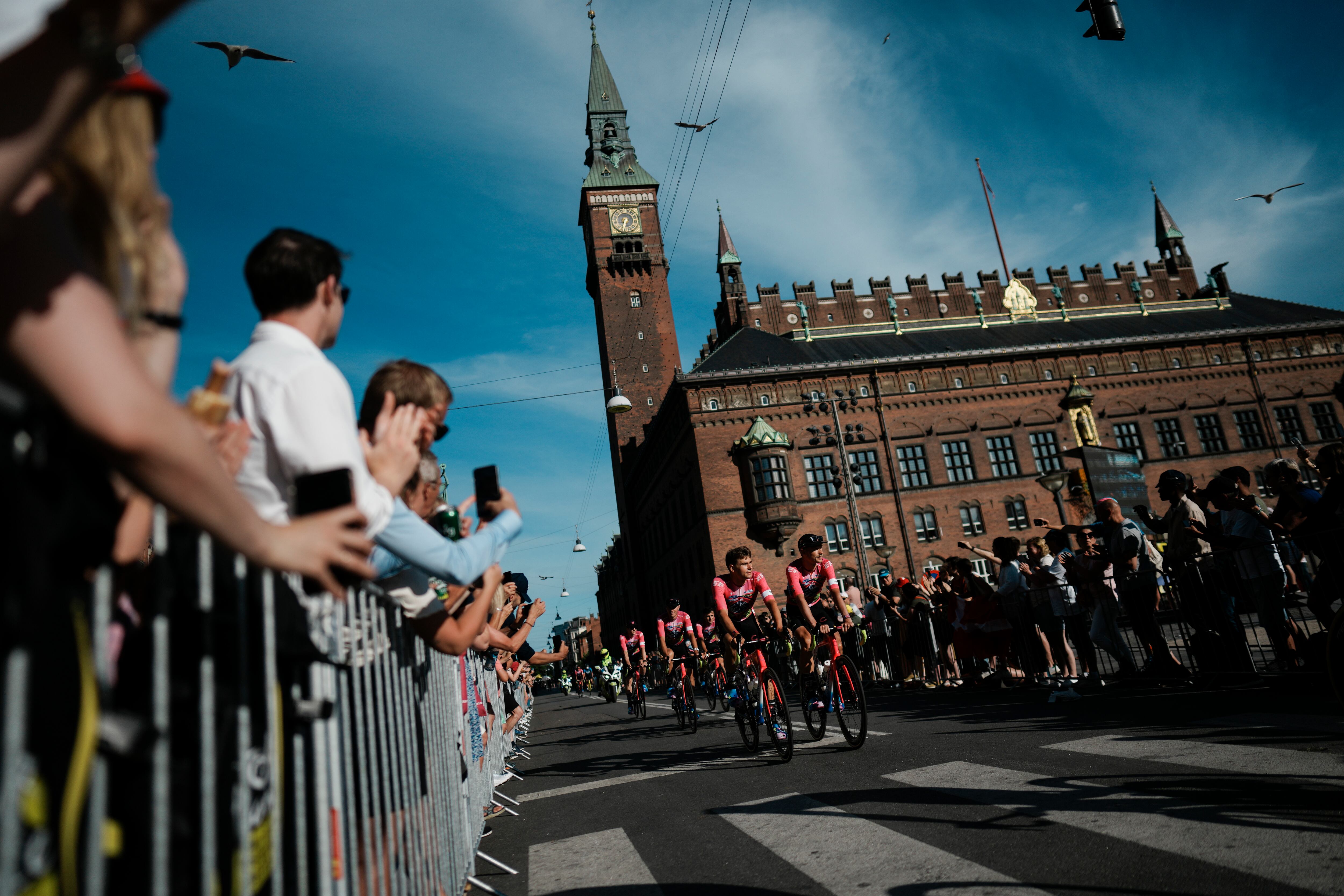 EF Education-EasyPost riders ride during the team presentation ahead of the Tour de France cycling race in Copenhagen, Denmark, Wednesday, June 29, 2022. The race starts Friday, July 1, the first stage is an individual time trial over 13.2 kilometers (8.2 miles) with start and finish in Copenhagen. (AP Photo/Thibault Camus)