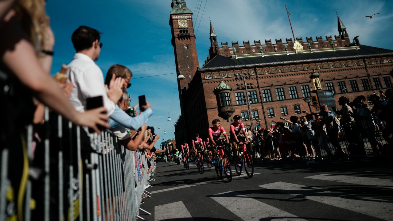 EF Education-EasyPost riders ride during the team presentation ahead of the Tour de France cycling race in Copenhagen, Denmark, Wednesday, June 29, 2022. The race starts Friday, July 1, the first stage is an individual time trial over 13.2 kilometers (8.2 miles) with start and finish in Copenhagen. (AP Photo/Thibault Camus)