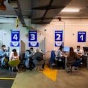 In this Feb. 4, 2021 file photo, Israelis receive a Pfizer-BioNTech COVID-19 vaccine from medical professionals at a coronavirus vaccination center set up on a shopping mall parking lot in Givataim, Israel. Candidates hoping to topple Benjamin Netanyahu in next month’s election are looking to the U.S. experience of 2020 for lessons about campaigning during a pandemic. (AP Photo/Oded Balilty, File)