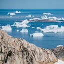 (FILES) In this file photo taken on August 15, 2019 an aerial photo taken on August 15, 2019 shows icebergs as they float along the eastern cost of Greenland near Kulusuk (aslo spelled Qulusuk). - Rising global temperature, rising sea levels, intensification of extreme events... The publication of the report of the Intergovernmental Panel on Climate Change (IPCC) is scheduled on August 9. (Photo by Jonathan NACKSTRAND / AFP)