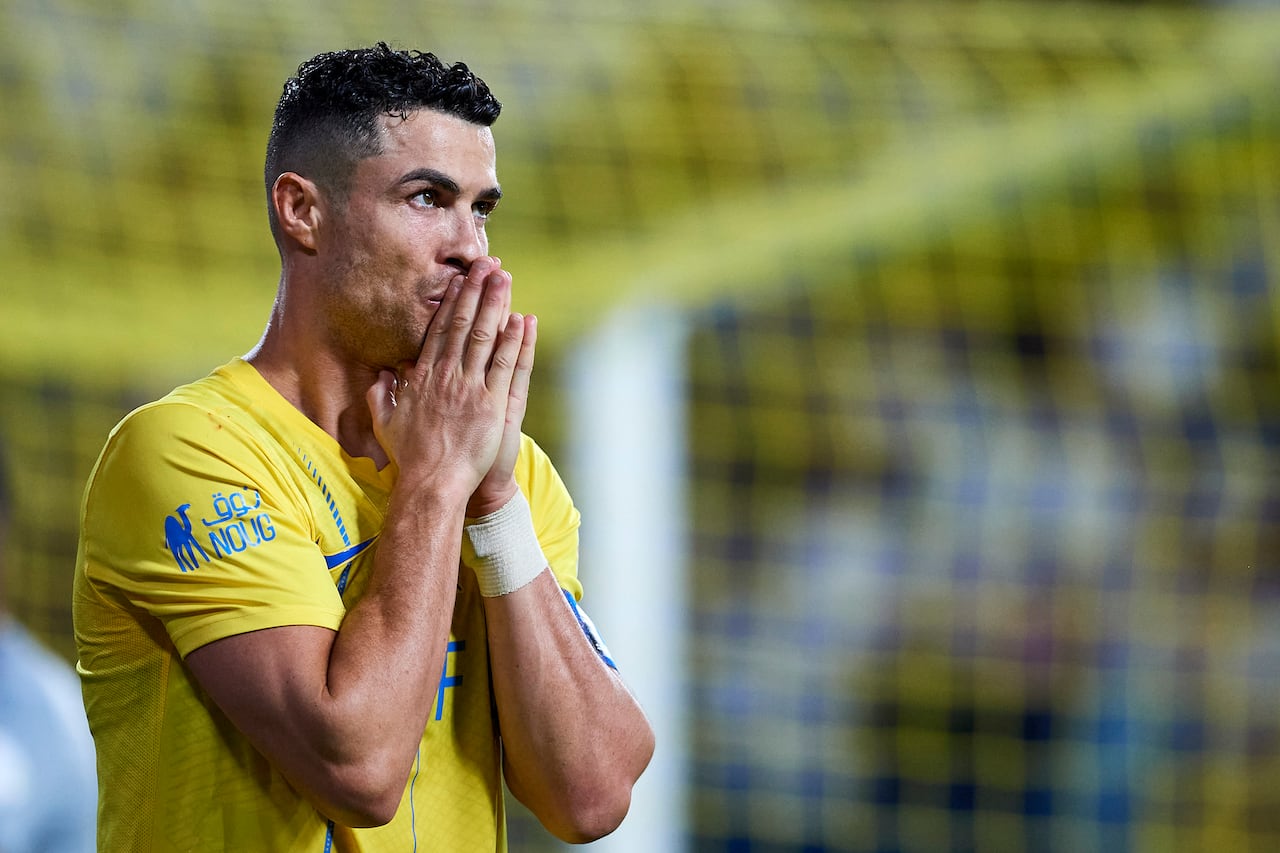 RIYADH, SAUDI ARABIA - OCTOBER 21: Cristiano Ronaldo of Al Nassr FC reacts after missing a shot during the Saudi Pro League football match between Al Nassr and Damac Club at Al Awal Park Stadium at King Saud University on October 21, 2023 in Riyadh, Saudi Arabia. (Photo by Adam Nurkiewicz/Getty Images)