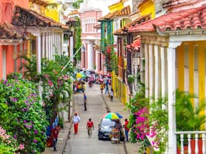 Street in walled city in Cartagena Colombia with people walking in the walled city and old town on July 21/2019 (note attached)