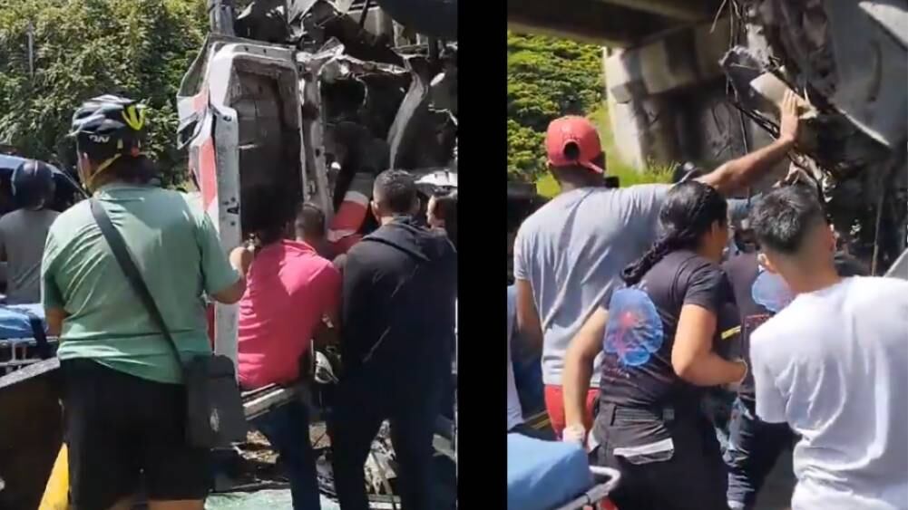 Personas intentan ayudar al conductor del camión de basura que cayó de un puente