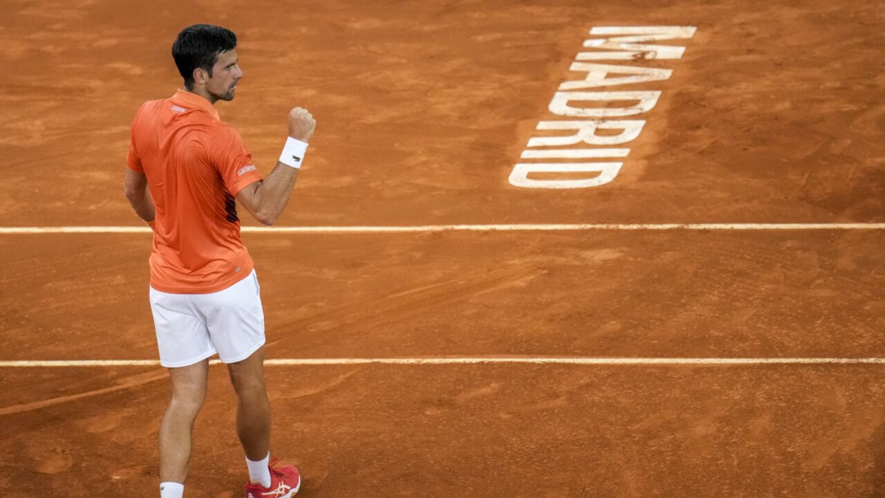 Serbia's Novak Djokovic celebrates his victory over Gael Monfils, of France, during their match at the Mutua Madrid Open tennis tournament in Madrid, Spain, Tuesday, May 3, 2022. (AP/Manu Fernandez)