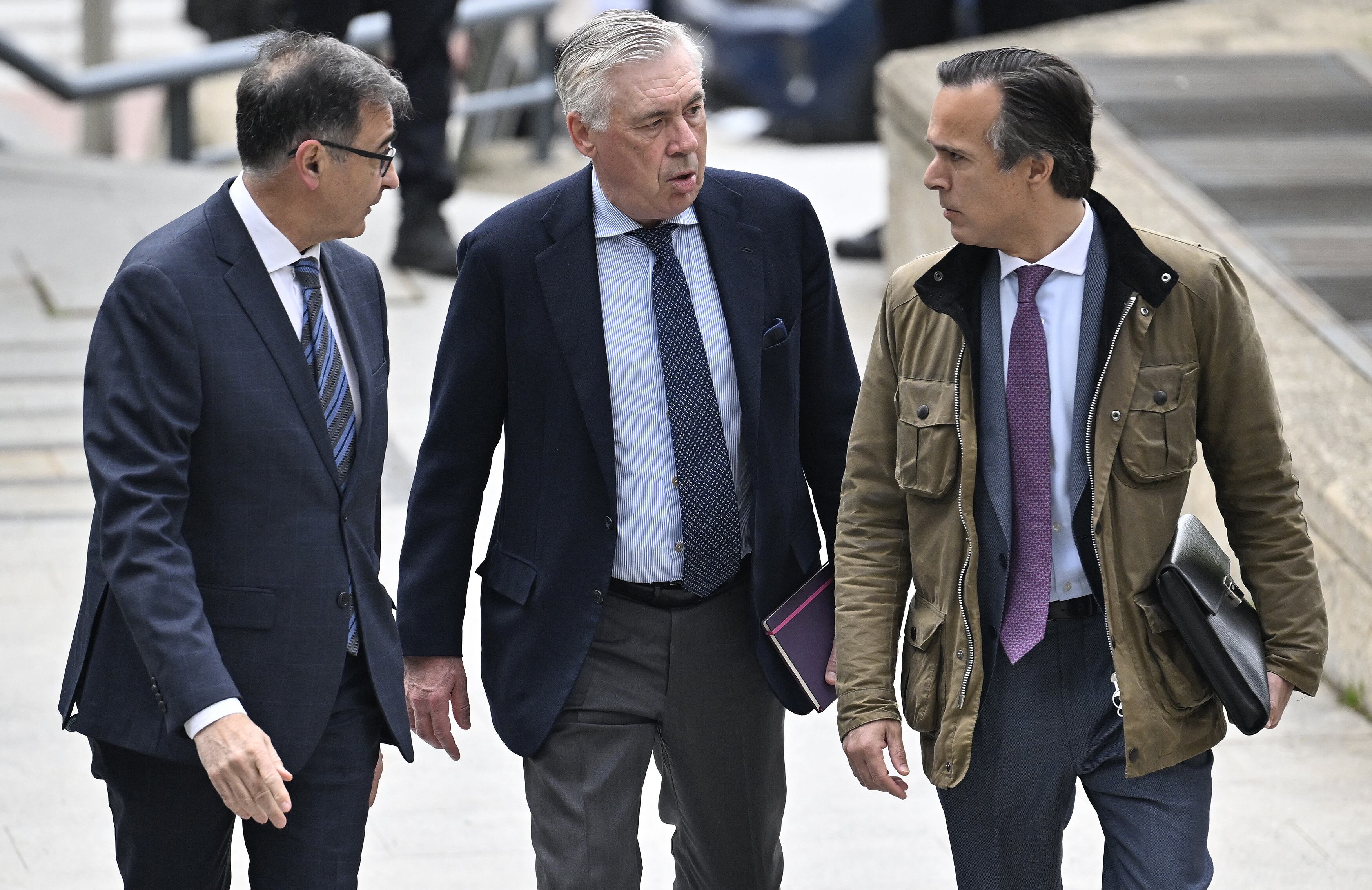 MADRID, SPAIN - APRIL 02: Real Madrid's Italian head coach Carlo Ancelotti (C) arrives at the High Court of Justice of Madrid to go on trial accused of tax evasion of more than 1 million euros from the Spanish Revenue in Madrid, Spain on April 02, 2025. Burak Akbulut / Anadolu (Photo by BURAK AKBULUT / Anadolu via AFP)