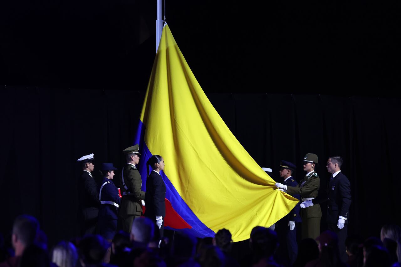 SANTIAGO, CHILE - NOVEMBER 05: Colombian flag is raised during the Closing Ceremony of Santiago 2023 Pan Am Games at Estadio Bicentenario de La Florida on November 05, 2023 in Santiago, Chile. Barranquilla will host the next edition of the Pan Am Games in 2027. (Photo by Ezra Shaw/Getty Images)