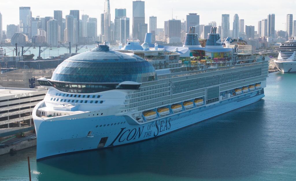 MIAMI, FLORIDA - FEBRUARY 03: In an aerial view, Royal Caribbean's Icon of the Seas, billed as the world's largest cruise ship, is moored at PortMiami after returning from its maiden voyage on February 03, 2024, in Miami, Florida. The 1,197-foot long ship cost $1.79 billion to build, has 20 decks, and can hold a maximum of 7,600 people. (Photo by Joe Raedle/Getty Images)