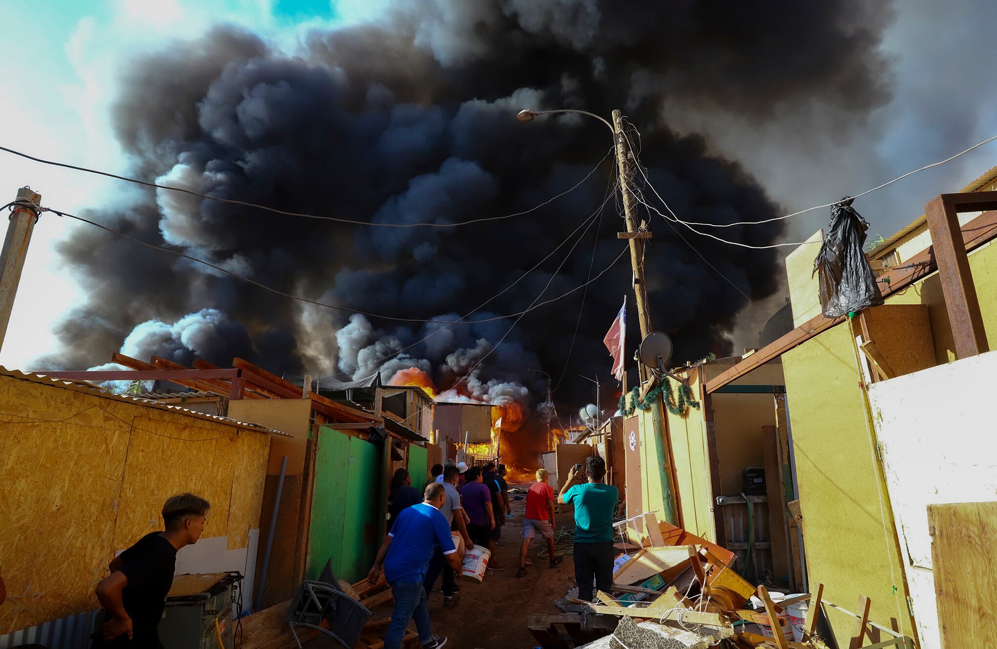 incendio en barrio de migrantes en Chile