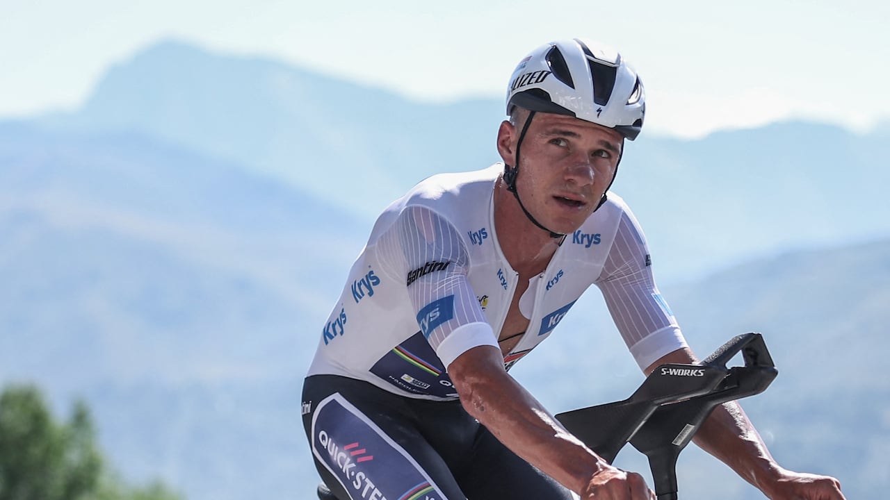 Soudal Quick-Step team's Belgian rider Remco Evenepoel wearing the best young rider's white jersey cycles during the 13th stage of the 112th edition of the Tour de France cycling race, 10.9 km individual time trial between Loudenvielle and Peyragudes, in the Pyrenees mountains of southwestern France, on July 18, 2025. (Photo by Anne-Christine POUJOULAT / AFP)