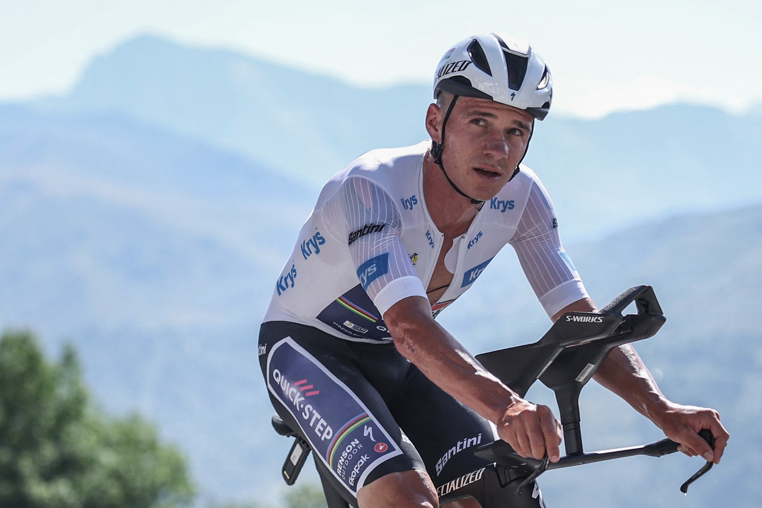 Soudal Quick-Step team's Belgian rider Remco Evenepoel wearing the best young rider's white jersey cycles during the 13th stage of the 112th edition of the Tour de France cycling race, 10.9 km individual time trial  between Loudenvielle and Peyragudes, in the Pyrenees mountains of southwestern France, on July 18, 2025. (Photo by Anne-Christine POUJOULAT / AFP)