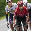 Colombia's Nairo Quintana, center, Spain's Omar Fraile, left, and Michael Woods of Canada climb Col des Saisies pass during the ninth stage of the Tour de France cycling race over 144.9 kilometers (90 miles) with start in Cluses and finish in Tignes, France, Sunday, July 4, 2021. (AP Photo/Daniel Cole)