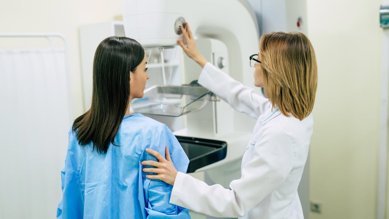 Young woman is having mammography examination at the hospital or private clinic with a professional female doctor.