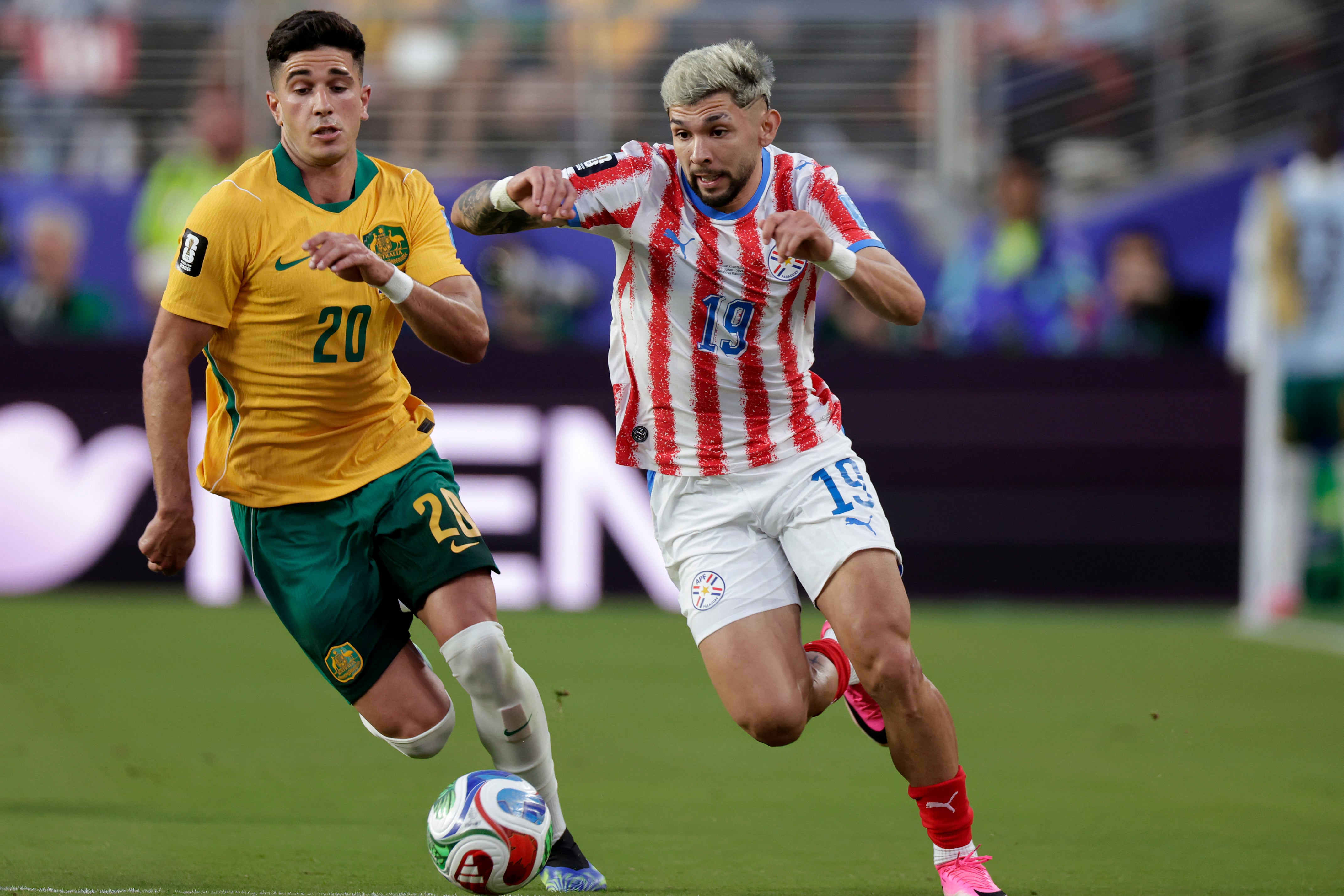 SAN FRANCISCO BAY AREA, UNITED STATES - JUNE 25: (L-R) Cristian Volpato of Australia, Julio Enciso of Paraguay during the World Cup match between Paraguay v Australia at the San Francisco Bay Area Stadium on June 25, 2026 in San Francisco Bay Area United States (Photo by Eric Verhoeven/Soccrates/Getty Images)
