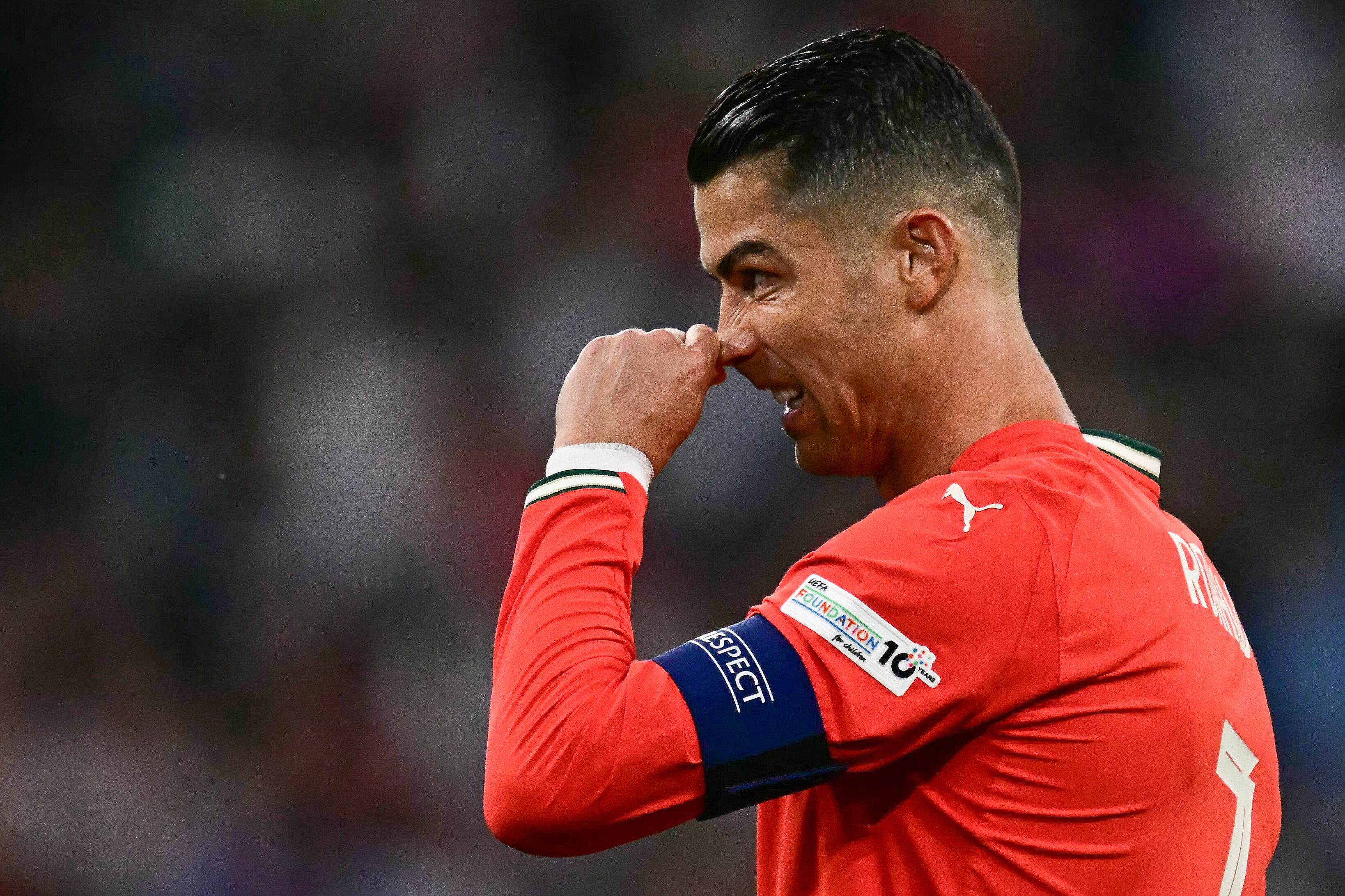 Portugal's forward #07 Cristiano Ronaldo reacts during the UEFA Nations League semi-final football match between Germany and Portugal in Munich, southern Germany on June 4, 2025. (Photo by Tobias SCHWARZ / AFP)