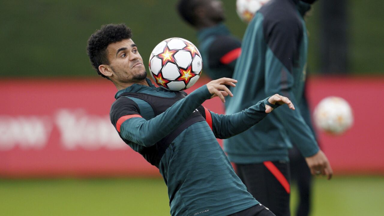 Liverpool's Luis Diaz attends a training session ahead of Wednesday's Champions League, first-leg semifinal soccer match against Villareal, at the AXA Training Centre, Liverpool, England, Tuesday, April 26, 2022. (AP/Peter Byrne/PA )