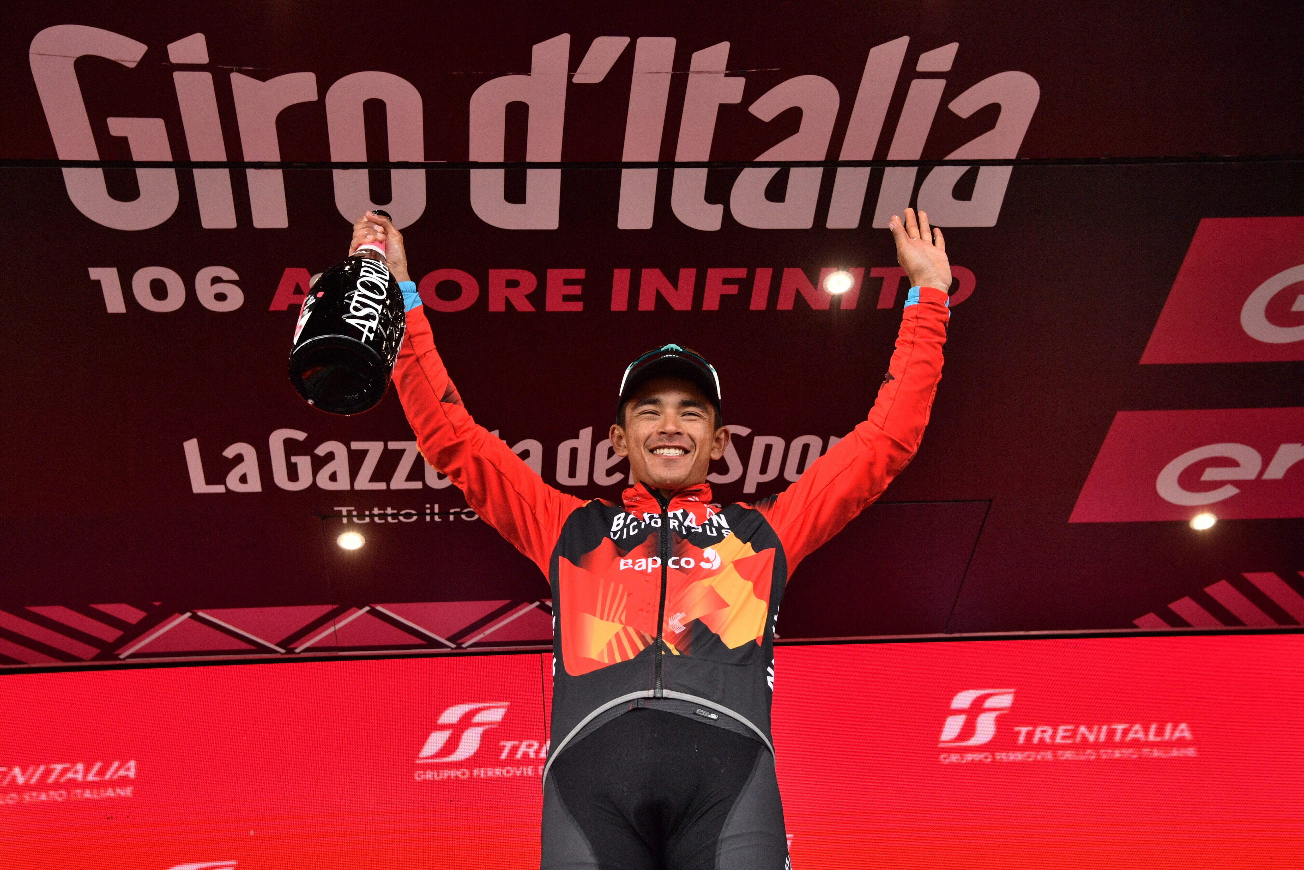 Colombia's Santiago Buitrago celebrates on podium winning the 19th stage of the Giro D'Italia , tour of Italy cycling race, from Longarone to Tre Cime di Lavaredo, Italy, Friday, May 26, 2023. (Massimo Paolone/LaPresse via AP)