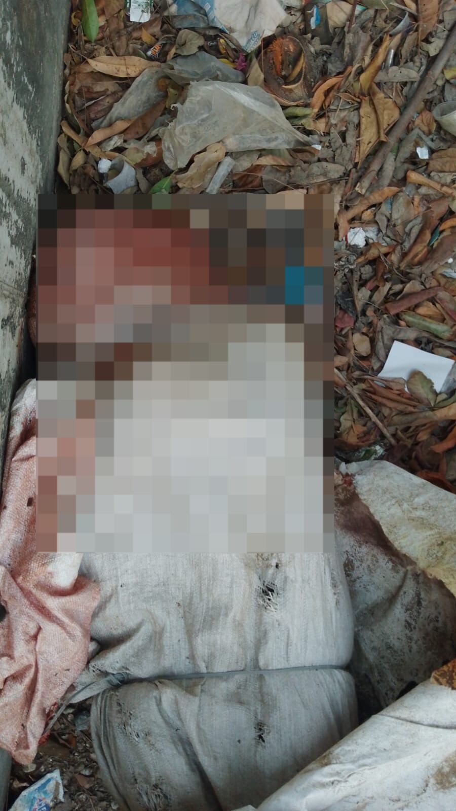 Uno de los cuerpos hallados dentro de un costal