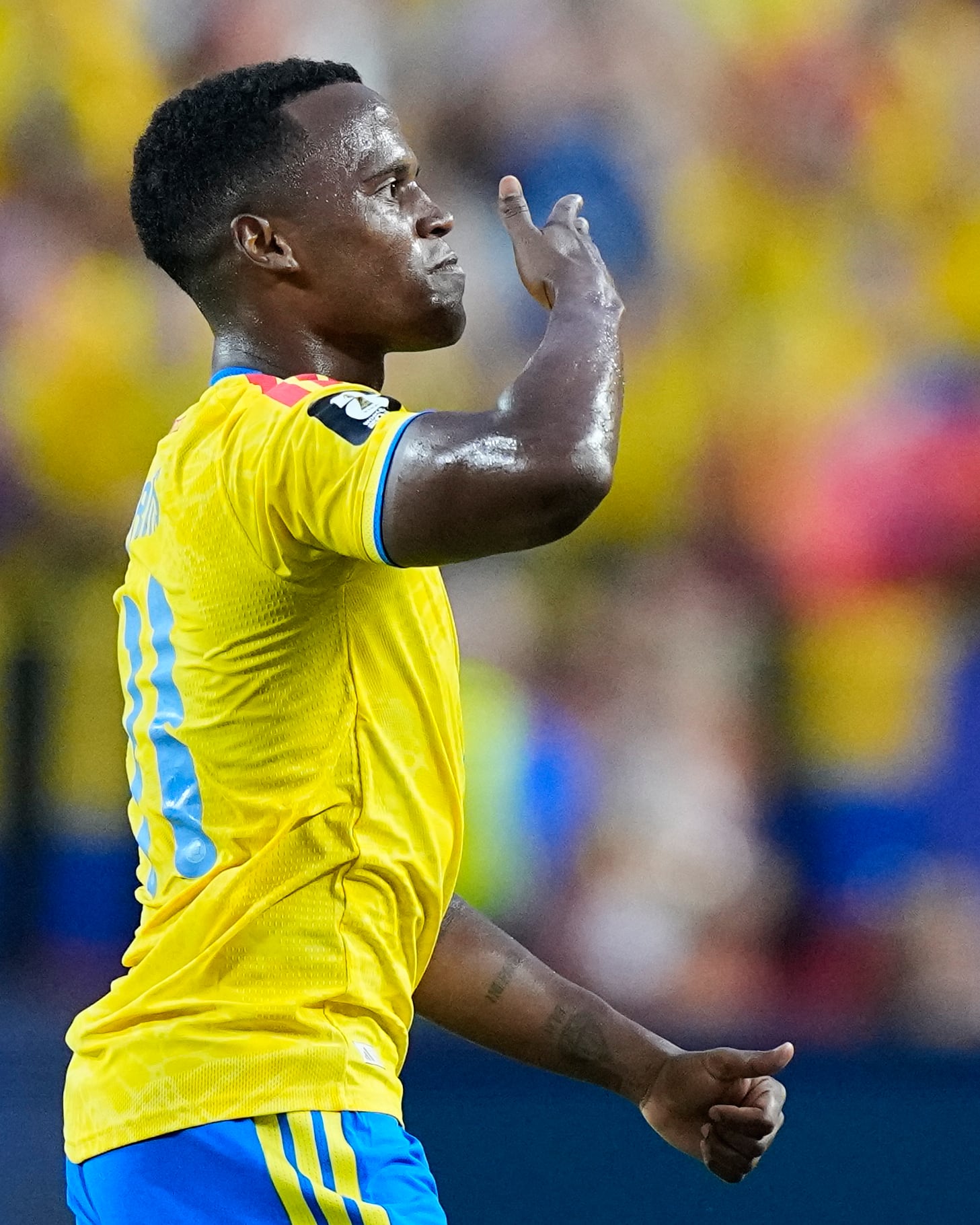 Colombia's Jhon Arias (11) reacts after scoring his team's first goal during the World Cup round of 32 soccer match between Colombia and Ghana in Kansas City, Mo., Friday, July 3, 2026. (AP Photo/Charlie Riedel)