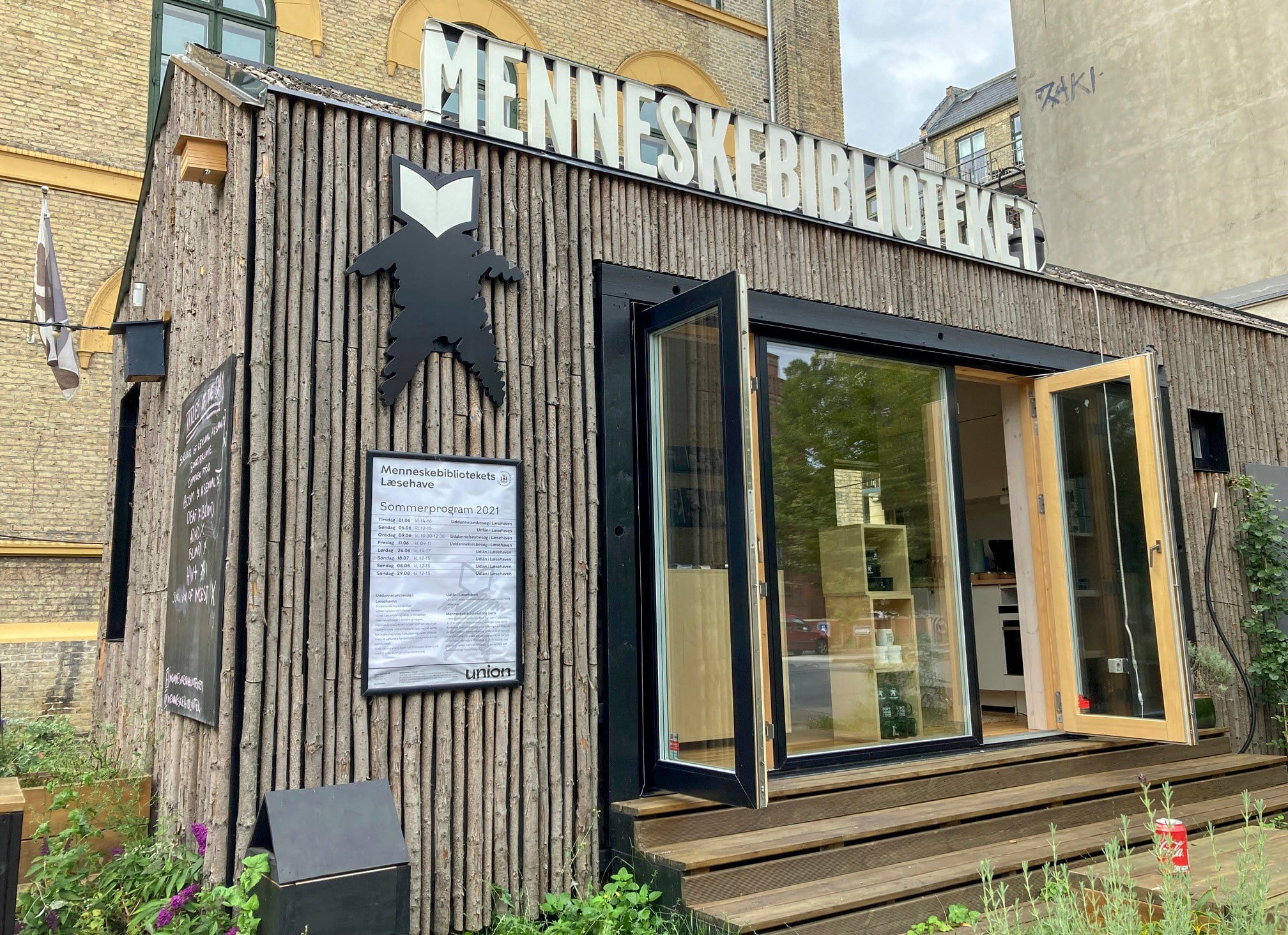 A photo taken on August 29, 2021 shows the depot of the Human Library on Noerre Alle street in Copenhagen. - At the 'Human Library', you can 'loan' a person to hear their life story and different experiences in a project to foster understanding and challenge prejudice. (Photo by Camille BAS-WOHLERT / AFP)