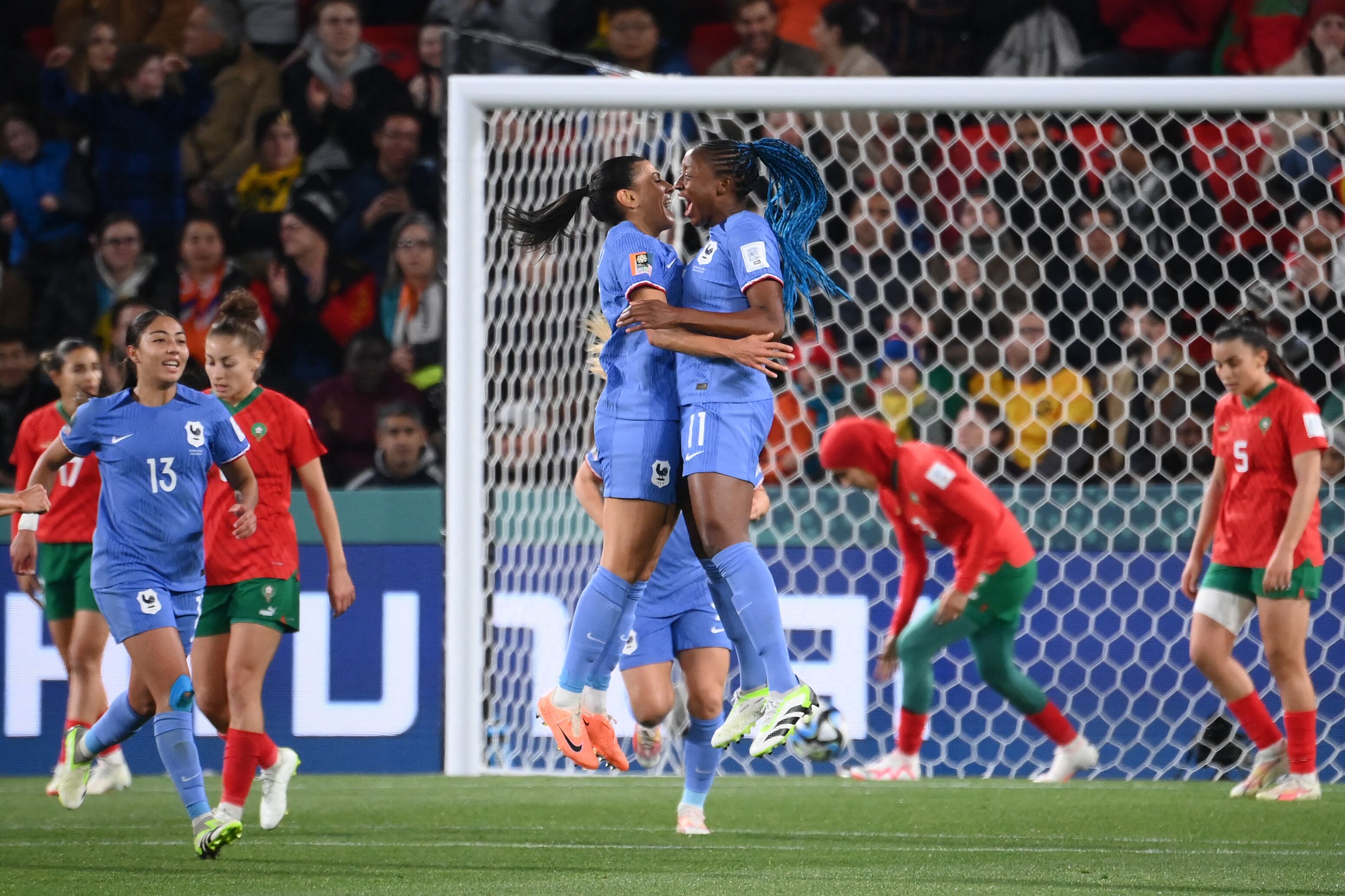 France's midfielder #15 Kenza Dali (C-L) celebrates scoring her team's second goal during the Australia and New Zealand 2023 Women's World Cup round of 16 football match between France and Morocco at Hindmarsh Stadium in Adelaide on August 8, 2023. (Photo by FRANCK FIFE / AFP)