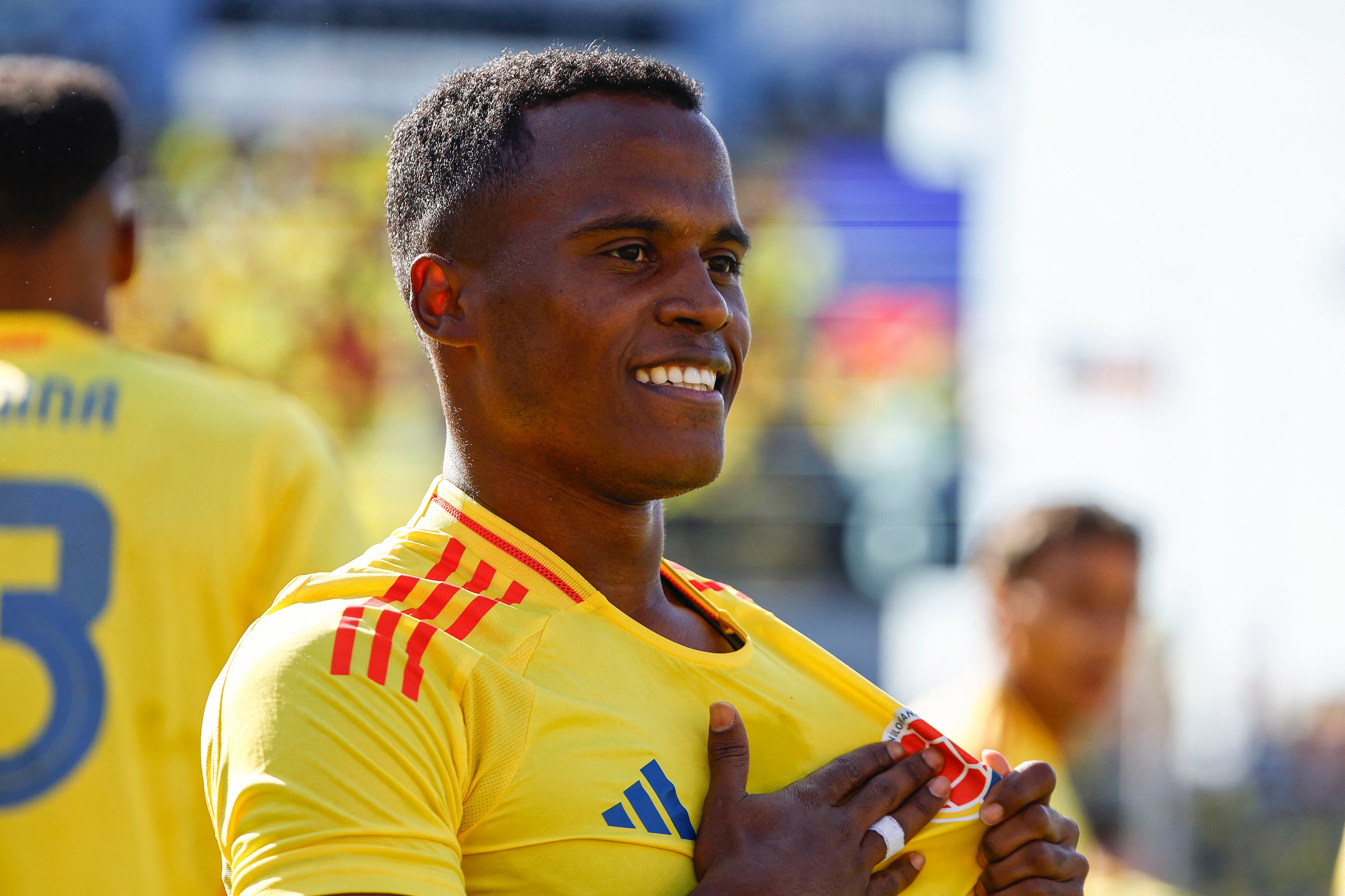 EAST HARTFORD, CT - JUNE 15: Jhon Arias of Colombia touches the logo on his jersey after scoring against Bolivia during the first half of their international friendly match at Pratt & Whitney Stadium on June 15, 2024 in Hartford, Connecticut. (Photo By Winslow Townson/Getty Images) (Photo by Winslow Townson / GETTY IMAGES NORTH AMERICA / Getty Images via AFP)