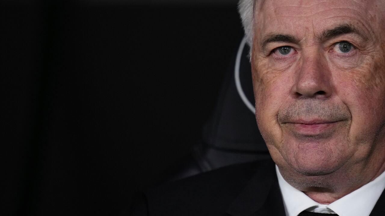 Real Madrid's head coach Carlo Ancelotti waits for the start of the Spanish La Liga soccer match between Real Madrid and Celta Vigo at the Santiago Bernabeu stadium in Madrid, Spain, Saturday, April 22, 2023. (AP Photo/Manu Fernandez)