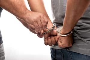 Handcuffed Man Being Released