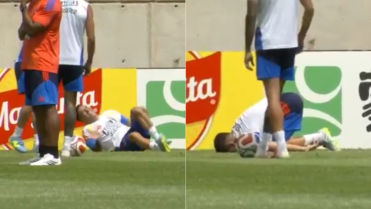 Juan Fernando Quintero en el suelo, tras una entrada menor de James Rodríguez