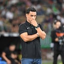 Atletico Nacional's new head coach Lucas Gonzalez looks on during a friendly football match between Colombia's Atletico Nacional and Venezuela's Deportivo Tachira at the Atanasio Girardot stadium in Medellin, Colombia, to raise funds for those affected by the June 24 earthquakes in Venezuela. (Photo by JAIME SALDARRIAGA / AFP)