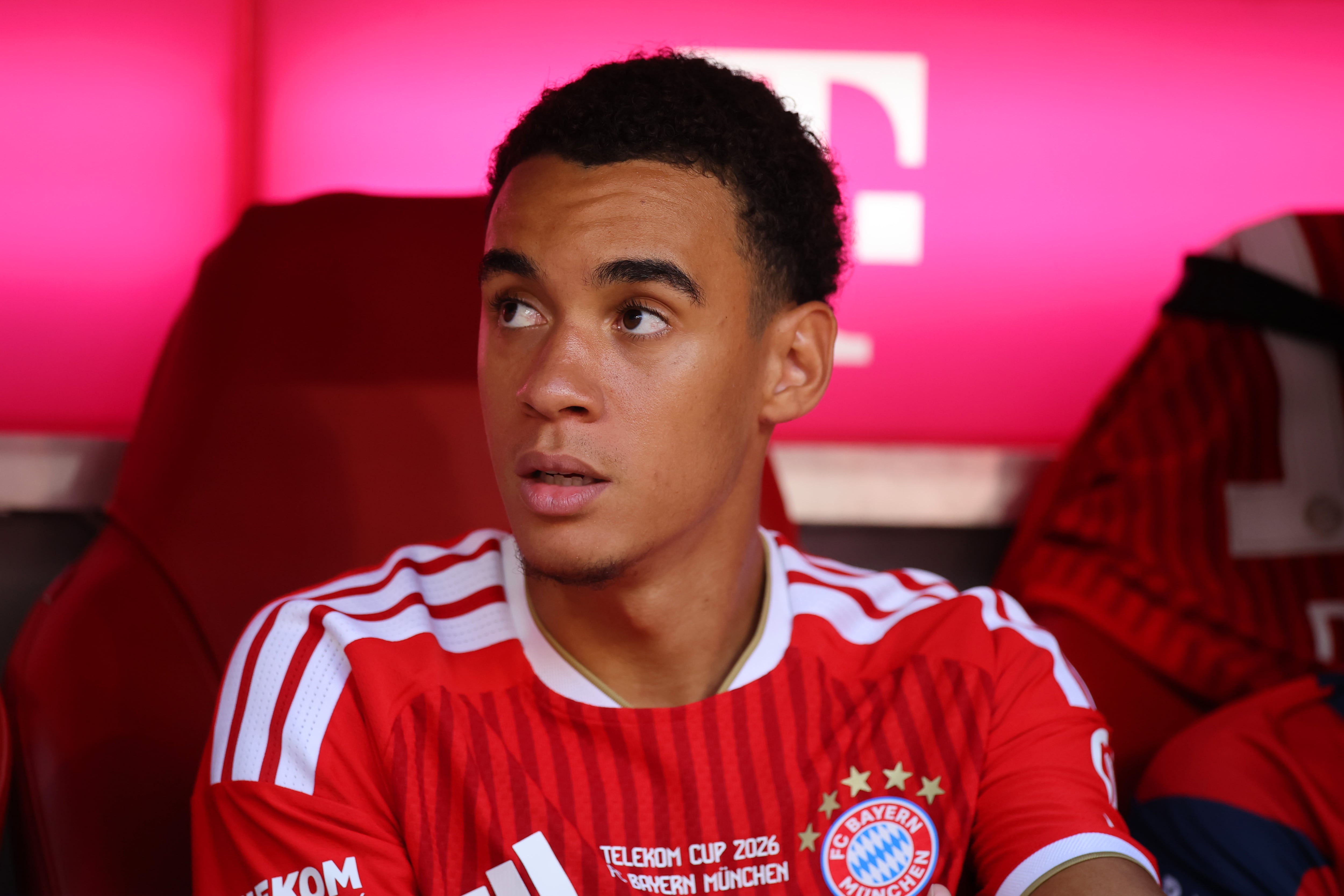 MUNICH, GERMANY - AUGUST 15: Jamal Musiala of Bayern Muenchen looks on prior to during the Telekom Cup match between FC Bayern München and RB Leipzig at Allianz Arena on August 15, 2026 in Munich, Germany. (Photo by Alex Grimm/Getty Images)