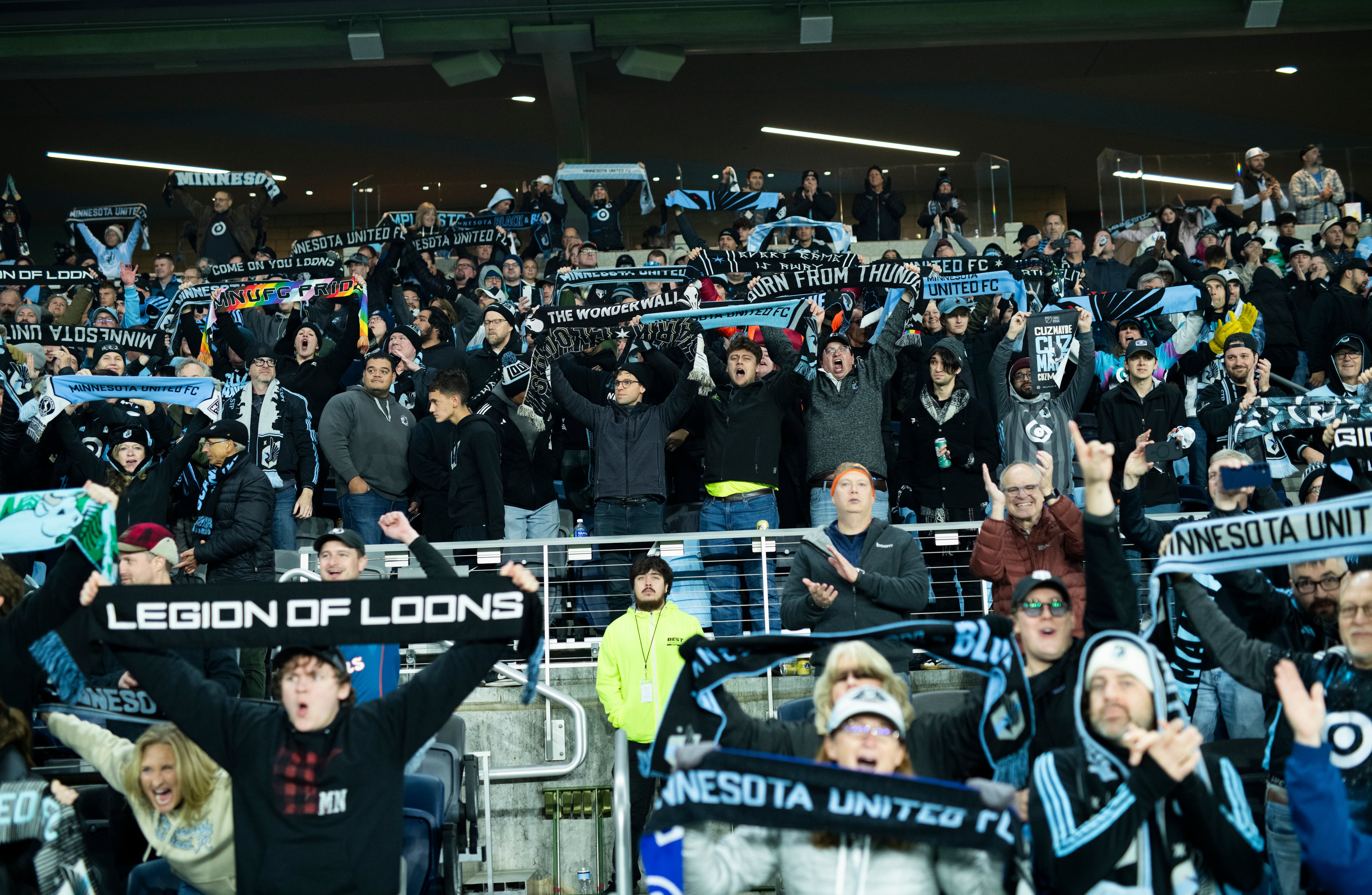 ST PAUL, MINNESOTA - OCTOBER 27: Minnesota United fans celebrate after the 2025 MLS Cup Playoff match against the Seattle Sounders at Allianz Field on October 27, 2025 in St Paul, Minnesota. (Photo by Stephen Maturen/Getty Images)