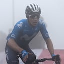 Team Movistar's Colombian rider Miguel Angel Lopez crosses the finish line in first place during the 18th stage of the 2021 La Vuelta cycling tour of Spain, a 162.6 km race from Salas to Altu d'El Gamoniteiru in Pola de Lena, on September 2, 2021. (Photo by MIGUEL RIOPA / AFP)