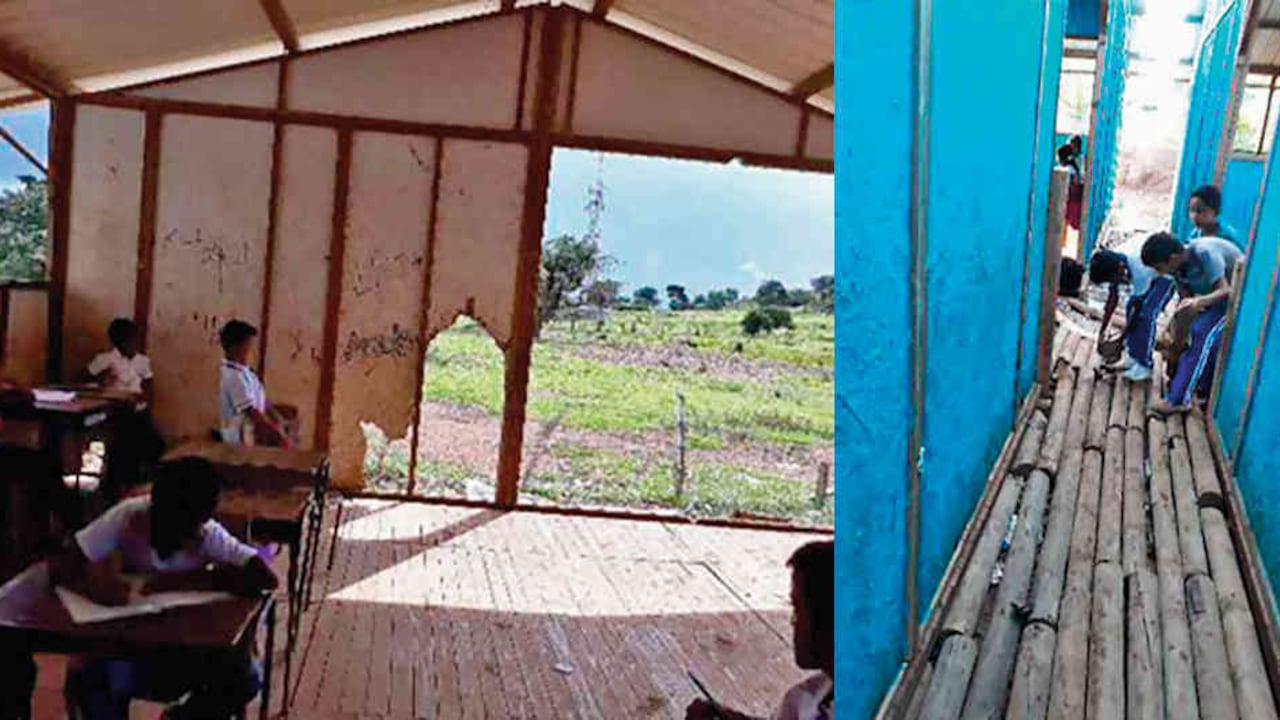 En Lorica los niños han tenido que acomodar las tablas del piso para poder ingresar a su salón de clases.
