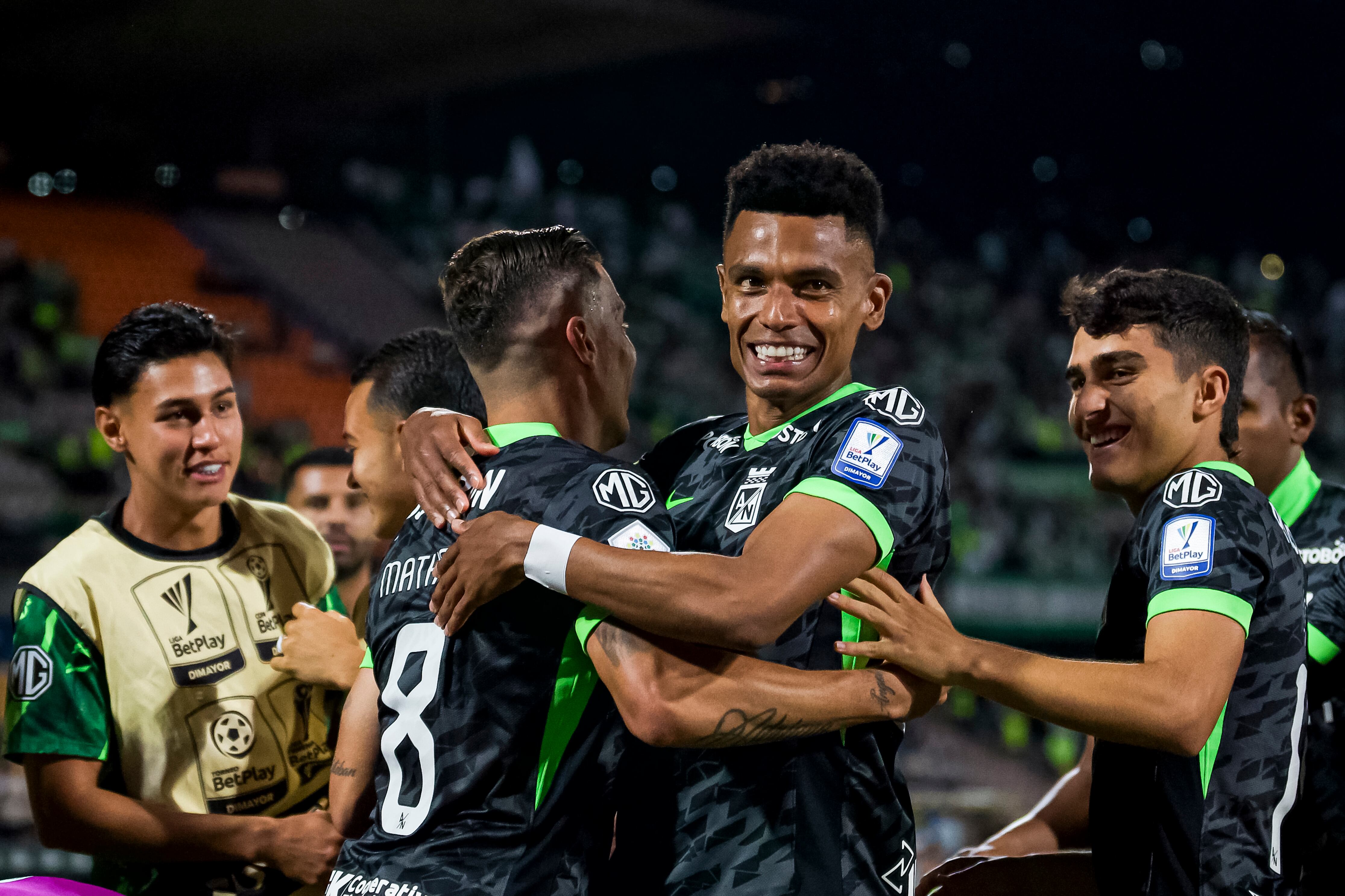 MEDELLIN, COLOMBIA - MARCH 13: Mateus Uribe of Atletico Nacional (C-L) celebrates his goal with teammates during a Liga BetPlay match between Atletico Nacional and Llaneros at Estadio Atanasio Girardot on March 13, 2026 in Medellin, Colombia. (Photo by Camila Ortega/Eurasia Sport Images/Getty Images)
